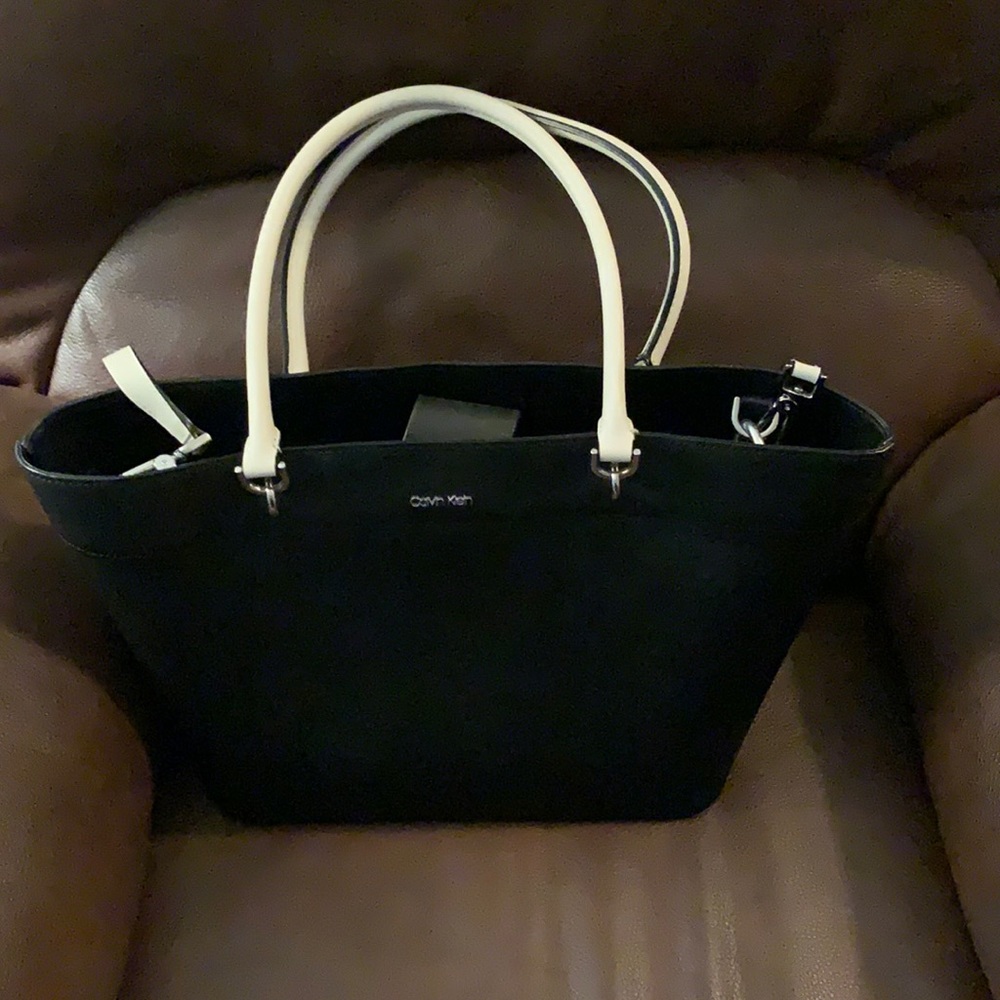 Calvin Klein leather purse, new/never used, has both handles/shoulder straps